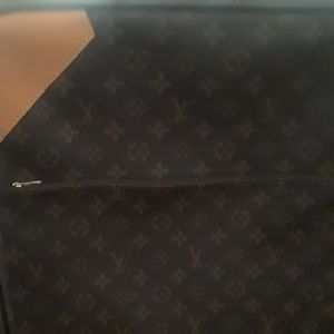 Louis Vuitton traveling suit case